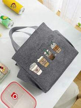 A Thermal Lunch Bag With Four Cups Of Black Coffee And A Heart, Leopard Print Pattern Printed On It,Insulated Bag With The "Lut Furst Caffee" Pattern Paired With A Black Cutlery Storage Bag