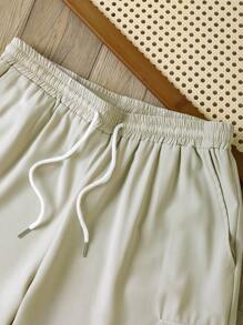 Manfinity Dauomo Men's Solid Color Cargo Pocket Relaxed Casual Shorts