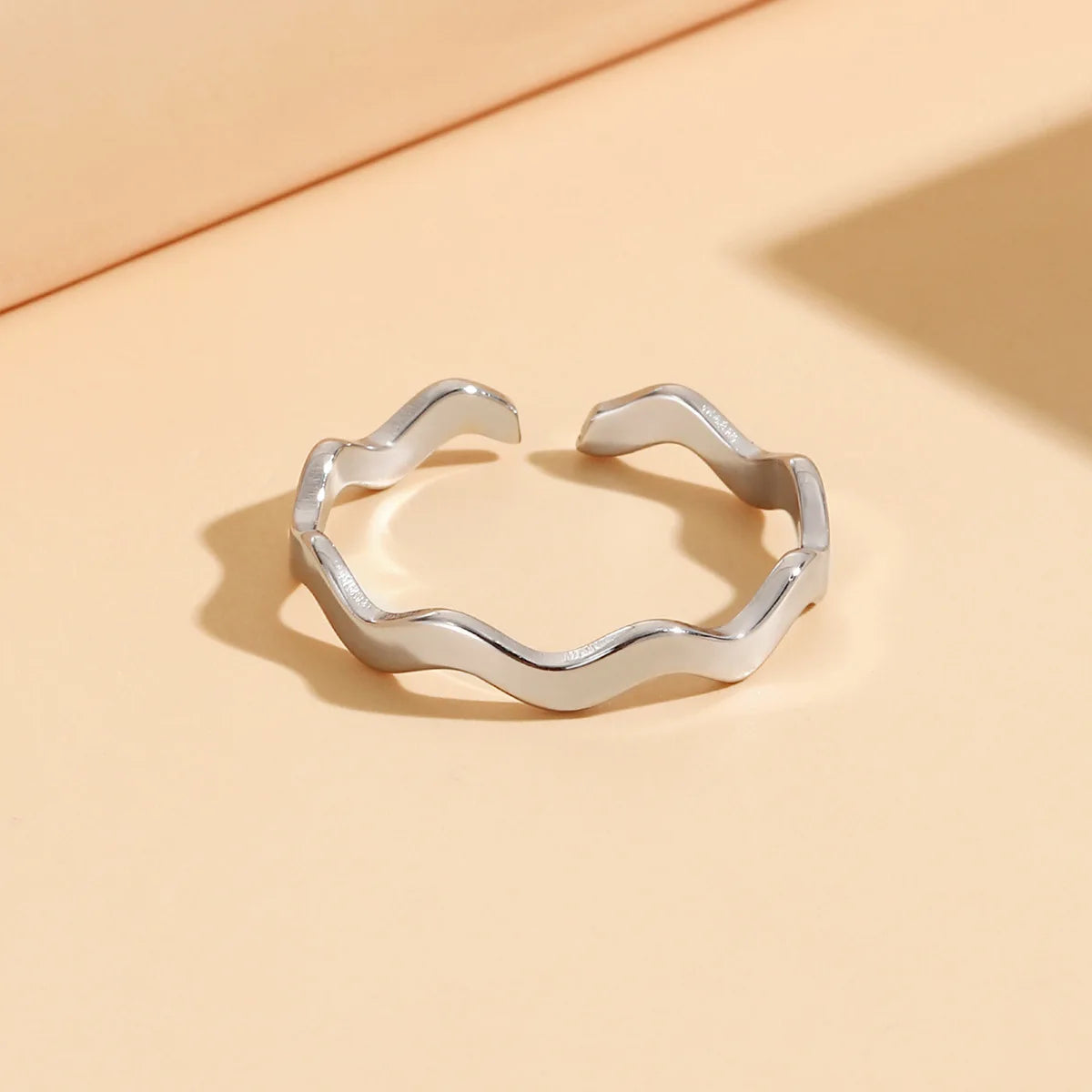 CARLIDANA Minimalist Stainless Steel Finger Ring for Women Girl Simple Design Silver Plated Wave Shape Ring for Women Girls