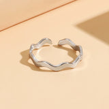 CARLIDANA Minimalist Stainless Steel Finger Ring for Women Girl Simple Design Silver Plated Wave Shape Ring for Women Girls