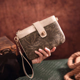 Exquisite Embossed Western Clutch Bag - Versatile Crossbody or Wristlet - Timeless Retro Style for Fashion-Forward Women